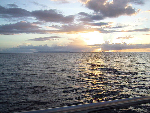 Sonnenuntergang über dem Meer von Kauai Fotos